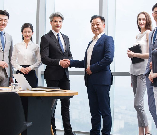 businessmen-shaking-hands-in-meeting-room-2026-01-05-05-31-10-utc