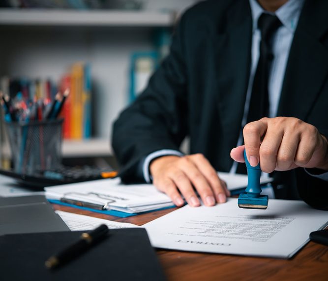 hand-man-stamping-documents-notary-public-in-offic-2026-01-08-07-25-30-utc